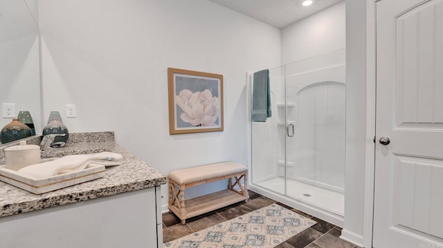 3416 Hank Dr, Jonesboro, AR 72404 - bathroom with vanity, a stall shower, and recessed lighting
