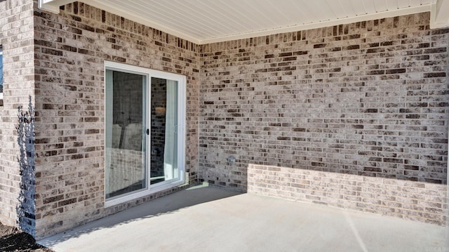 3416 Hank Dr, Jonesboro, AR 72404 - entrance to property featuring a patio area and brick siding