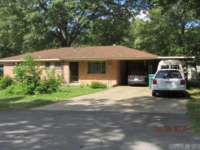 16 Frostwood Dr, Sherwood, AR 72120 - ranch-style home featuring concrete driveway, an attached carport, and brick siding