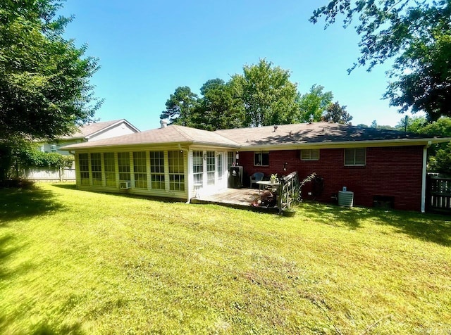 6312 Sandy Ln, Little Rock, AR 72204 - rear view of property featuring a sunroom and brick siding