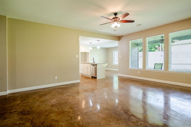 2702 Gage Dr, Benton, AR 72019 - unfurnished living room featuring concrete floors and a ceiling fan