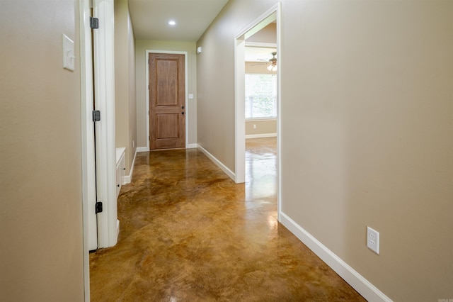 2702 Gage Dr, Benton, AR 72019 - hallway with concrete flooring and baseboards