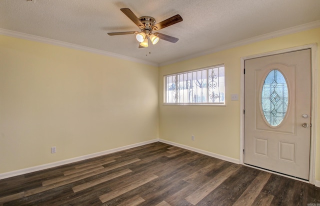 9425 S 365th Hwy, Little Rock, AR 72206 - foyer entrance with healthy amount of natural light, dark wood-style flooring, ceiling fan, a textured ceiling, and ornamental molding
