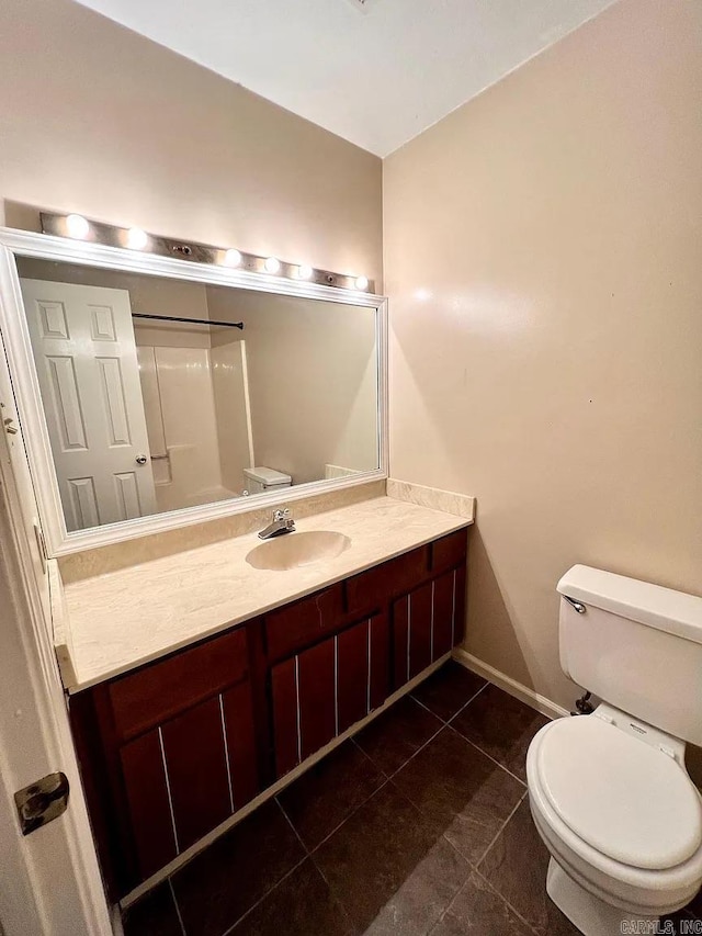 bathroom with vanity and tile patterned floors
