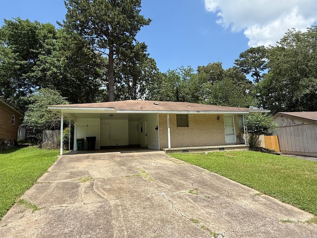 3003 Vancouver Dr, Little Rock, AR 72204 - ranch-style home featuring driveway, brick siding, and an attached carport