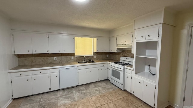 3003 Vancouver Dr, Little Rock, AR 72204 - kitchen featuring white appliances, under cabinet range hood, backsplash, white cabinetry, and a textured ceiling