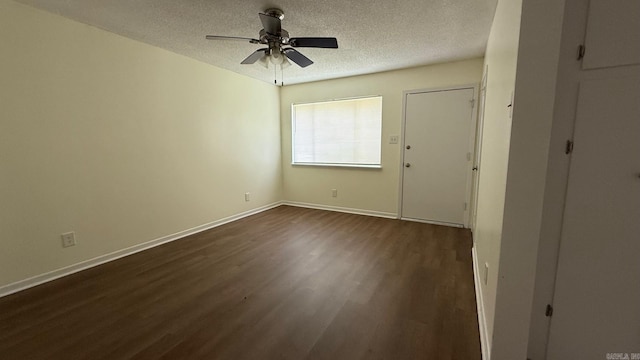 3003 Vancouver Dr, Little Rock, AR 72204 - unfurnished room with dark wood-type flooring, a textured ceiling, and a ceiling fan
