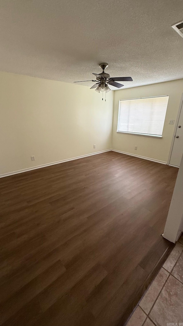 3003 Vancouver Dr, Little Rock, AR 72204 - unfurnished room featuring ceiling fan, wood finished floors, and a textured ceiling