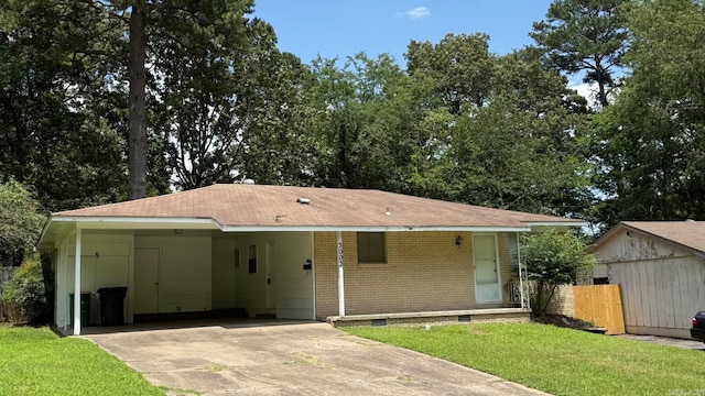 3003 Vancouver Dr, Little Rock, AR 72204 - view of front of house featuring crawl space, driveway, a carport, brick siding, and roof with shingles