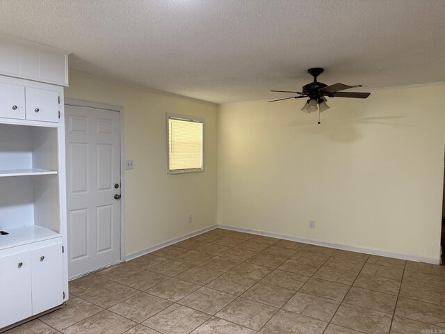 3003 Vancouver Dr, Little Rock, AR 72204 - unfurnished room with a textured ceiling, ceiling fan, and light tile patterned flooring