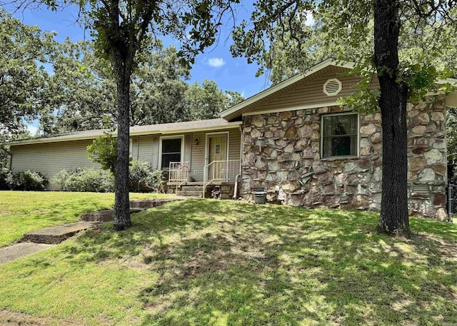 701 Emerald Gardens Dr, North Little Rock, AR 72118 - single story home featuring stone siding and a front yard