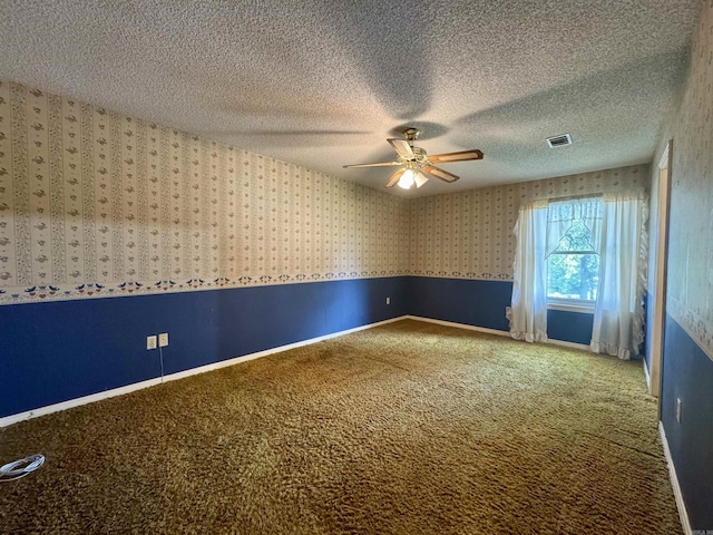 701 Emerald Gardens Dr, North Little Rock, AR 72118 - spare room featuring carpet flooring, a ceiling fan, a textured ceiling, and wallpapered walls
