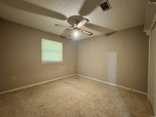 701 Emerald Gardens Dr, North Little Rock, AR 72118 - carpeted spare room with a textured ceiling and ceiling fan