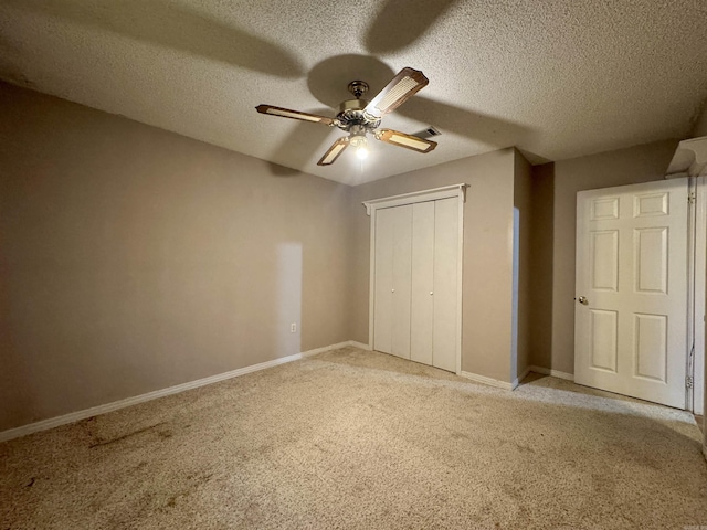 701 Emerald Gardens Dr, North Little Rock, AR 72118 - unfurnished bedroom featuring light carpet, a closet, a textured ceiling, and ceiling fan
