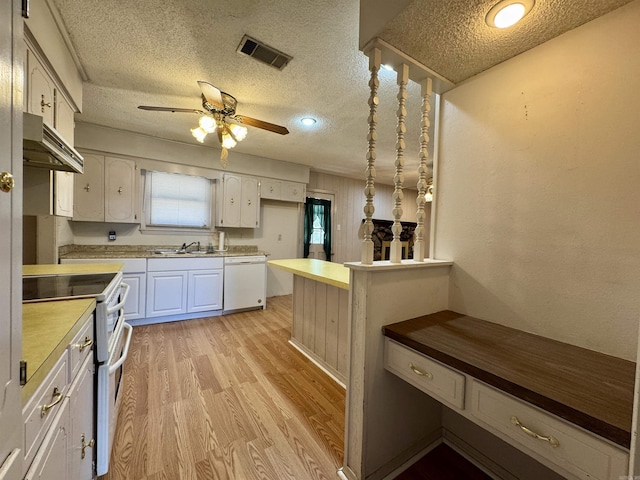 701 Emerald Gardens Dr, North Little Rock, AR 72118 - kitchen featuring white appliances, under cabinet range hood, a textured ceiling, light wood-style flooring, and a ceiling fan