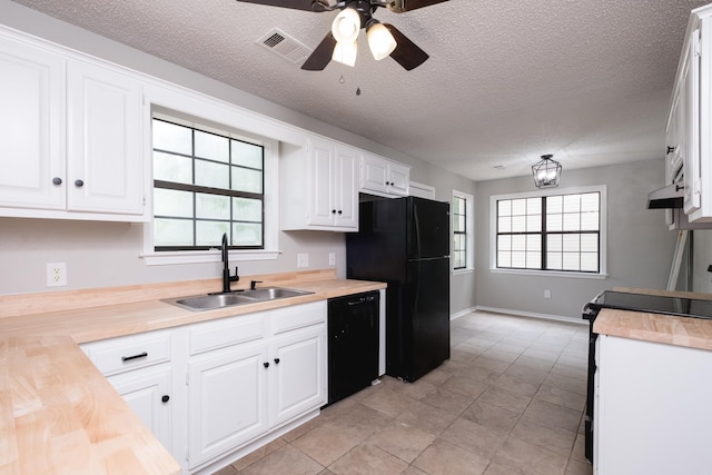 311 Nix Rd, Little Rock, AR 72211 - kitchen featuring black appliances, a ceiling fan, butcher block countertops, white cabinetry, and a textured ceiling
