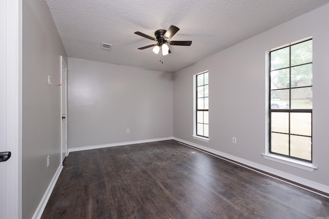 311 Nix Rd, Little Rock, AR 72211 - empty room with dark wood-style floors, a textured ceiling, and a ceiling fan