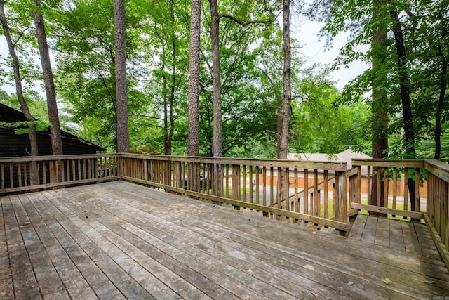 311 Nix Rd, Little Rock, AR 72211 - wooden terrace featuring view of wooded area