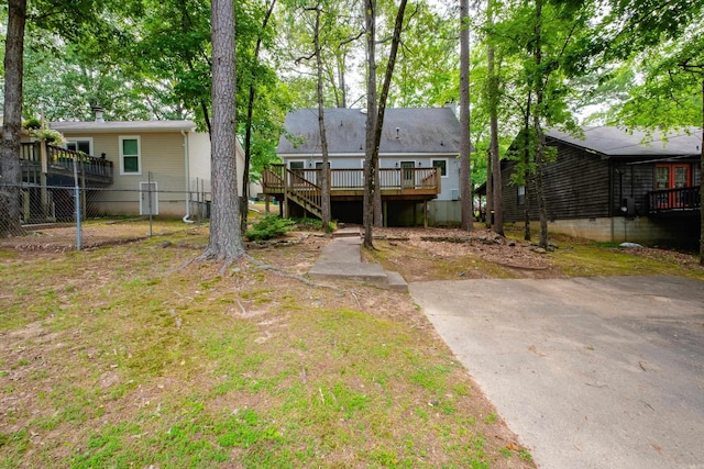 311 Nix Rd, Little Rock, AR 72211 - rear view of house featuring a deck and stairs