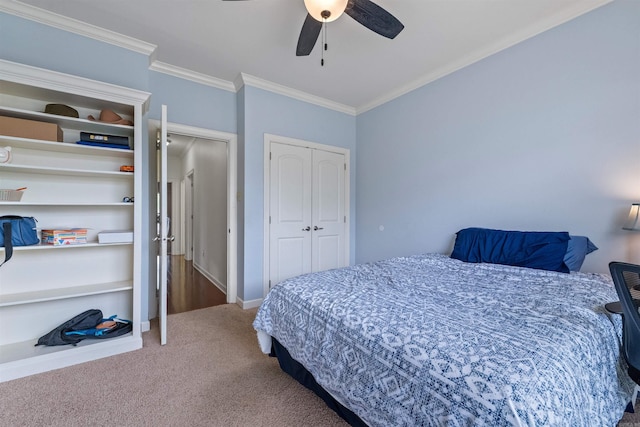 109 Sandstone Cv, Sherwood, AR 72120 - bedroom featuring ornamental molding, carpet floors, a closet, and a ceiling fan