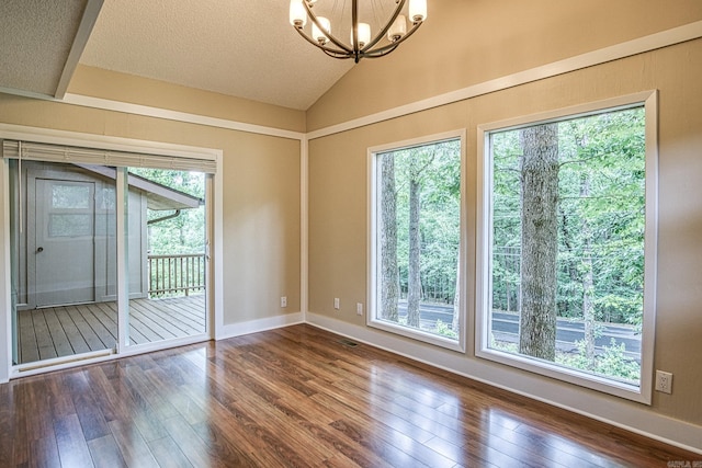 1 Halcon Pl, Hot Springs Village, AR 71909 - spare room with dark wood finished floors, a chandelier, lofted ceiling, and a textured ceiling