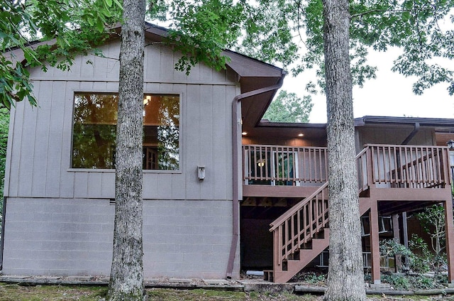 1 Halcon Pl, Hot Springs Village, AR 71909 - view of side of property with a wooden deck and stairs