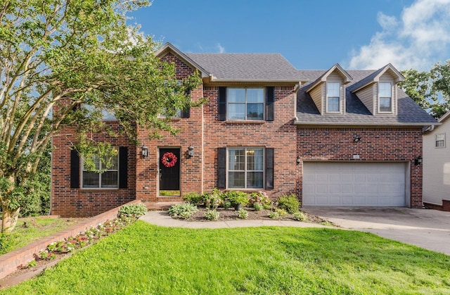 15 Rocky Crest Ct, Little Rock, AR 72211 - view of front of property featuring brick siding, a front lawn, driveway, and roof with shingles