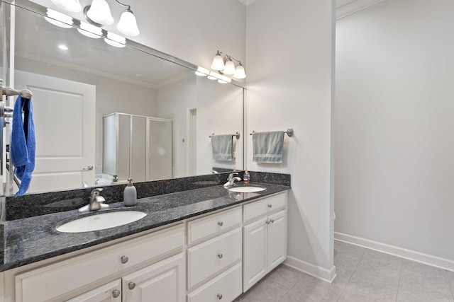 48 Ranch Ridge Rd, Little Rock, AR 72223 - bathroom featuring ornamental molding, a stall shower, double vanity, and tile patterned flooring