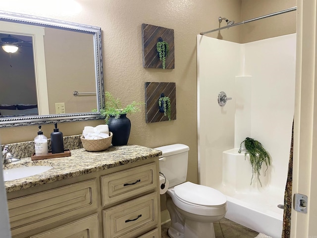 101 Cottage Loop, Heber Springs, AR 72543 - full bathroom featuring a shower, vanity, tile patterned flooring, and a textured wall