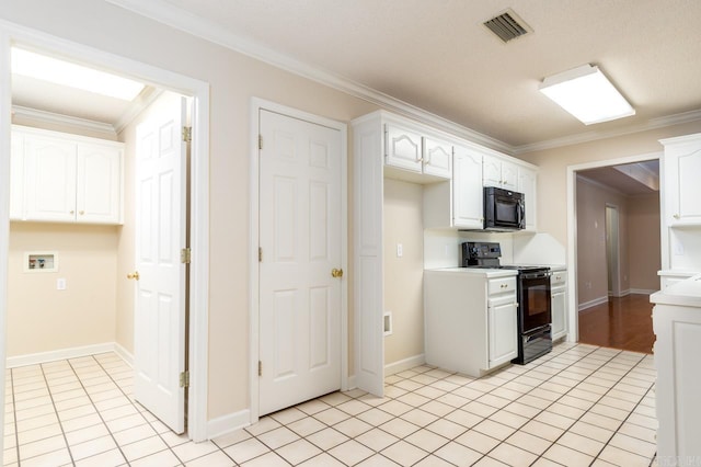 1940 Payne Ln, Conway, AR 72034 - kitchen with black appliances, white cabinetry, ornamental molding, light countertops, and light tile patterned floors