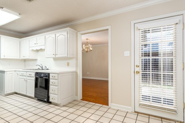1940 Payne Ln, Conway, AR 72034 - kitchen featuring black dishwasher, plenty of natural light, ornamental molding, a chandelier, and white cabinets
