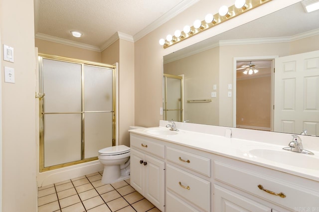 1940 Payne Ln, Conway, AR 72034 - full bath with tile patterned flooring, double vanity, a shower stall, ceiling fan, and crown molding