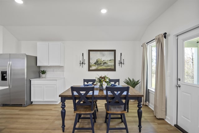 6804 Cypress Trl, North Little Rock, AR 72113 - dining room with light wood-style floors, lofted ceiling, and recessed lighting