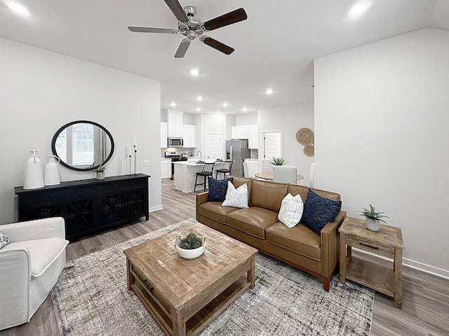 10501 Leyland Rd, North Little Rock, AR 72113 - living area with light wood finished floors, ceiling fan, and recessed lighting