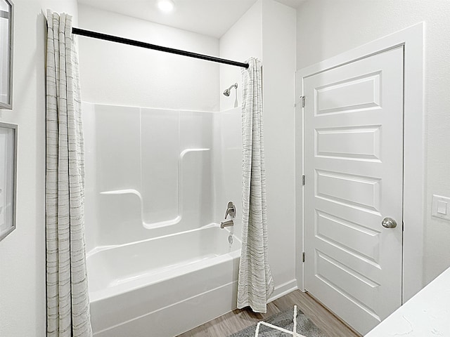 10501 Leyland Rd, North Little Rock, AR 72113 - full bath with shower / tub combo with curtain and wood finished floors