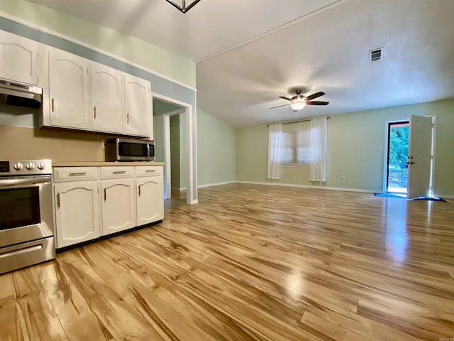 779 Brenda St, Camden, AR 71701 - kitchen with stainless steel appliances, open floor plan, light wood finished floors, white cabinetry, and under cabinet range hood