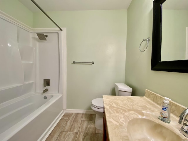 779 Brenda St, Camden, AR 71701 - bathroom featuring washtub / shower combination, vanity, and wood finished floors