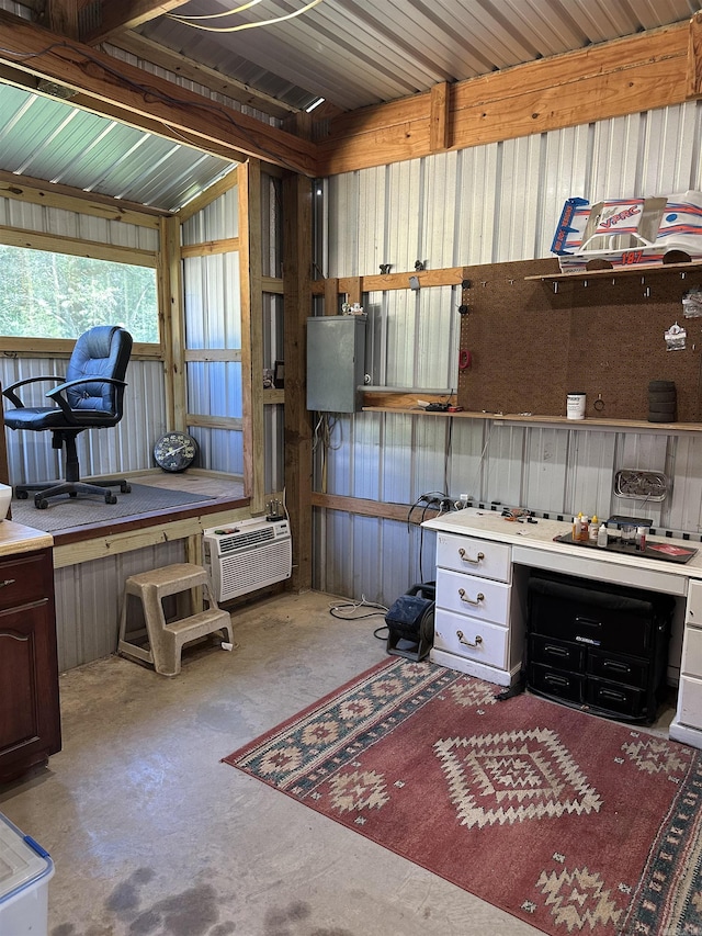 14400 Pikewood Dr, Alexander, AR 72002 - miscellaneous room with unfinished concrete floors and a wall unit AC