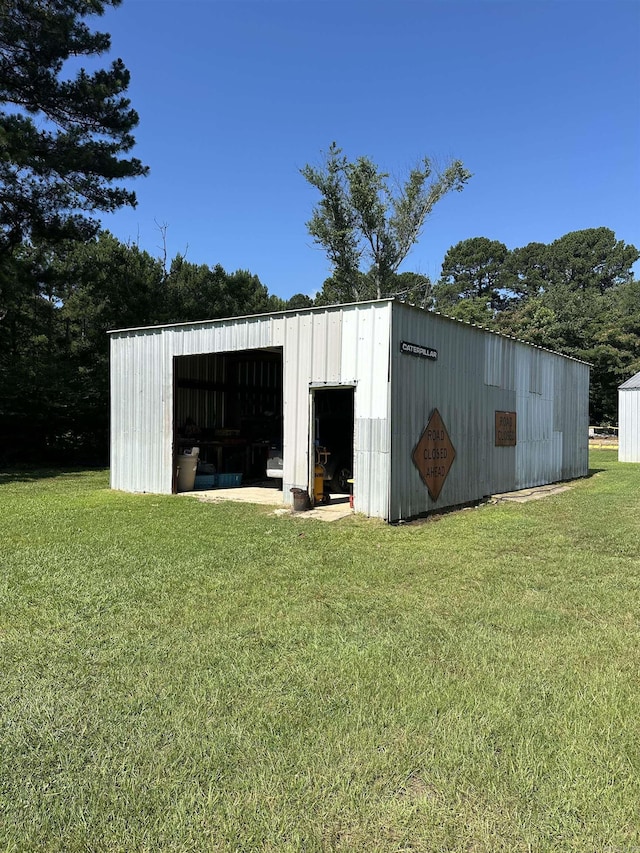14400 Pikewood Dr, Alexander, AR 72002 - view of pole building with a yard