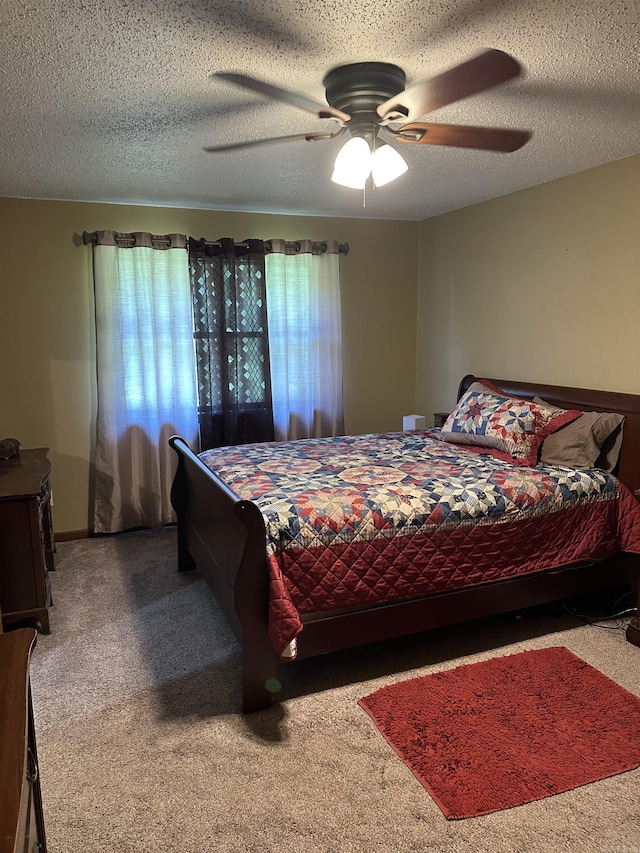 14400 Pikewood Dr, Alexander, AR 72002 - carpeted bedroom with a ceiling fan and a textured ceiling