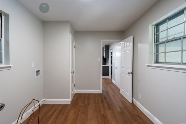 3109 Donaghey Dr, North Little Rock, AR 72116 - hallway with wood finished floors and baseboards