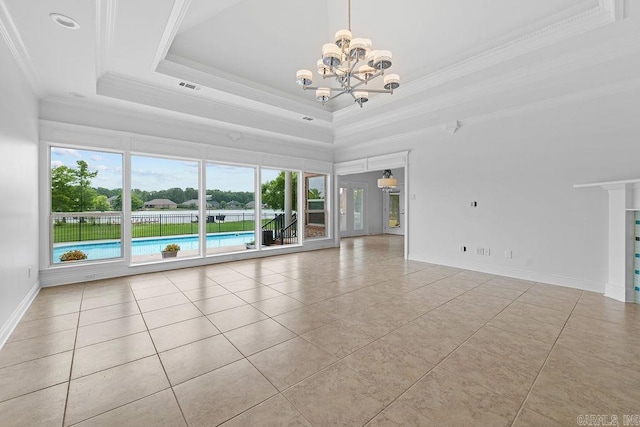 6733 Austin Bay Ct, Sherwood, AR 72120 - spare room featuring tile patterned flooring, a chandelier, plenty of natural light, a raised ceiling, and ornamental molding