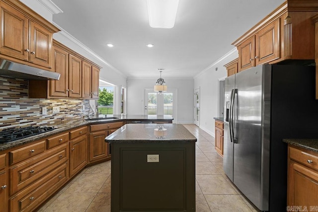 6733 Austin Bay Ct, Sherwood, AR 72120 - kitchen featuring stainless steel fridge with ice dispenser, gas stovetop, ornamental molding, brown cabinets, and backsplash