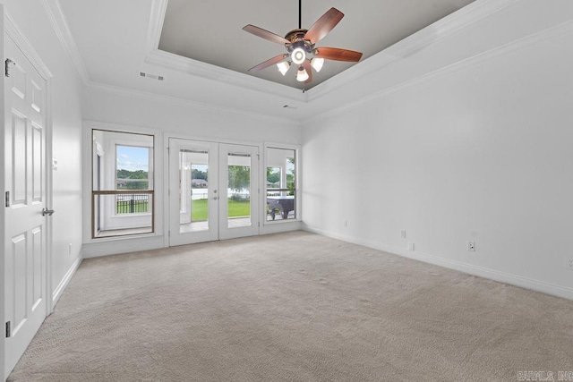 6733 Austin Bay Ct, Sherwood, AR 72120 - unfurnished room with a raised ceiling, carpet floors, ceiling fan, french doors, and crown molding