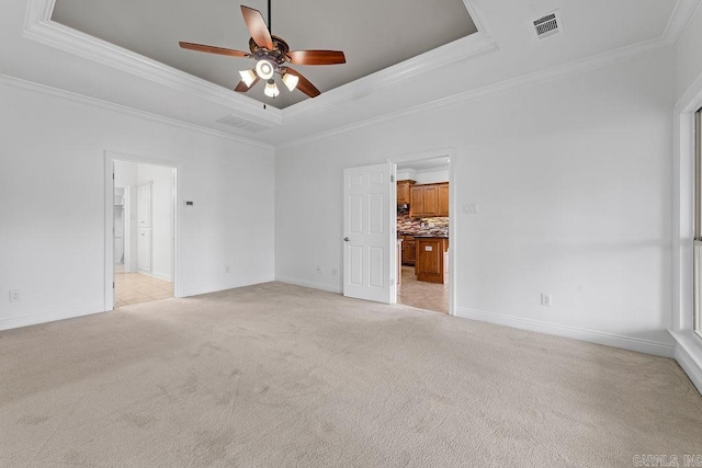 6733 Austin Bay Ct, Sherwood, AR 72120 - unfurnished room with a raised ceiling, light colored carpet, a ceiling fan, and ornamental molding