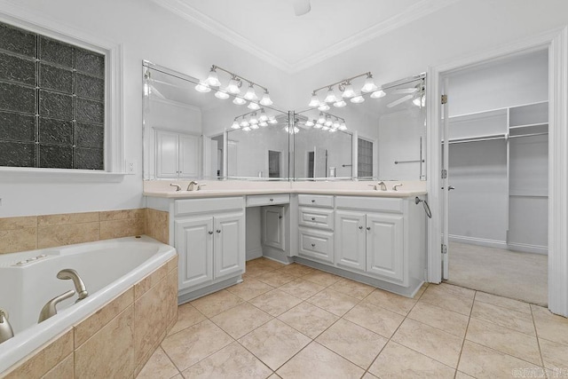 6733 Austin Bay Ct, Sherwood, AR 72120 - full bath with double vanity, crown molding, tile patterned flooring, a garden tub, and ceiling fan