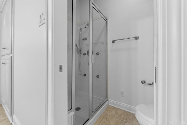 6733 Austin Bay Ct, Sherwood, AR 72120 - bathroom with a stall shower and tile patterned floors