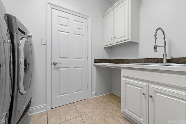 6733 Austin Bay Ct, Sherwood, AR 72120 - laundry room with cabinet space and light tile patterned floors
