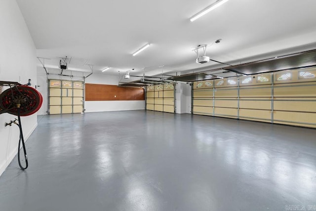 6733 Austin Bay Ct, Sherwood, AR 72120 - garage featuring a garage door opener