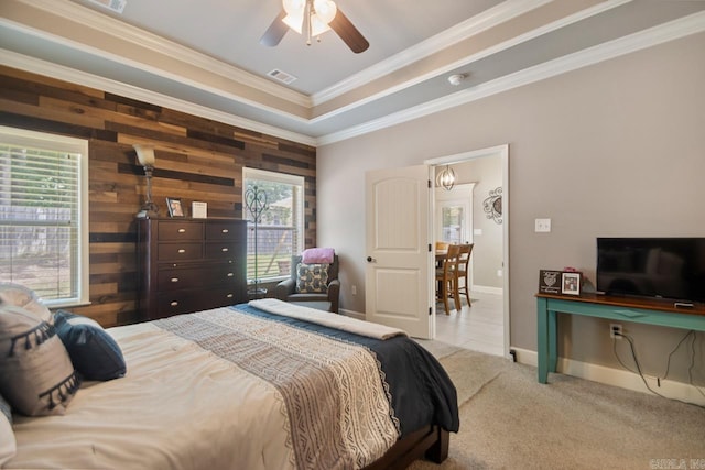 274 Reuben Dr, Alexander, AR 72202 - carpeted bedroom with crown molding, wooden walls, and ceiling fan